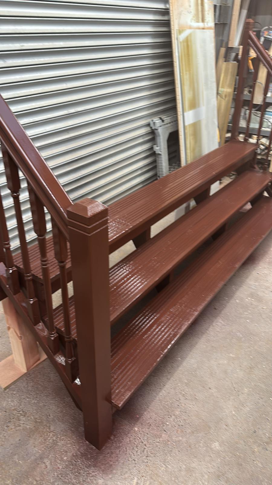 Traditional painted staircase with classic spindle railings